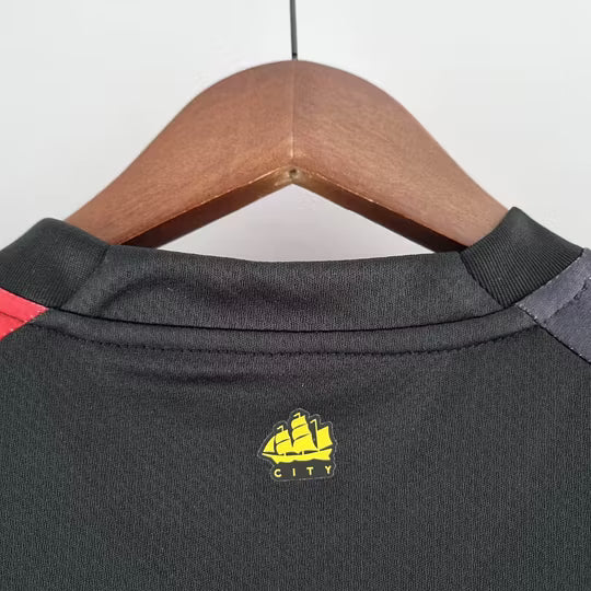 Manchester City Away Jersey 2022/23 – Black & Red Stripes Football Shirt